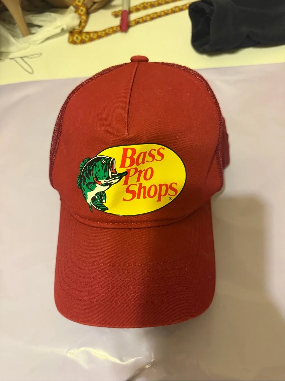 Bass Pro Shops Red Trucker Hat with Yellow Logo and Green Bass